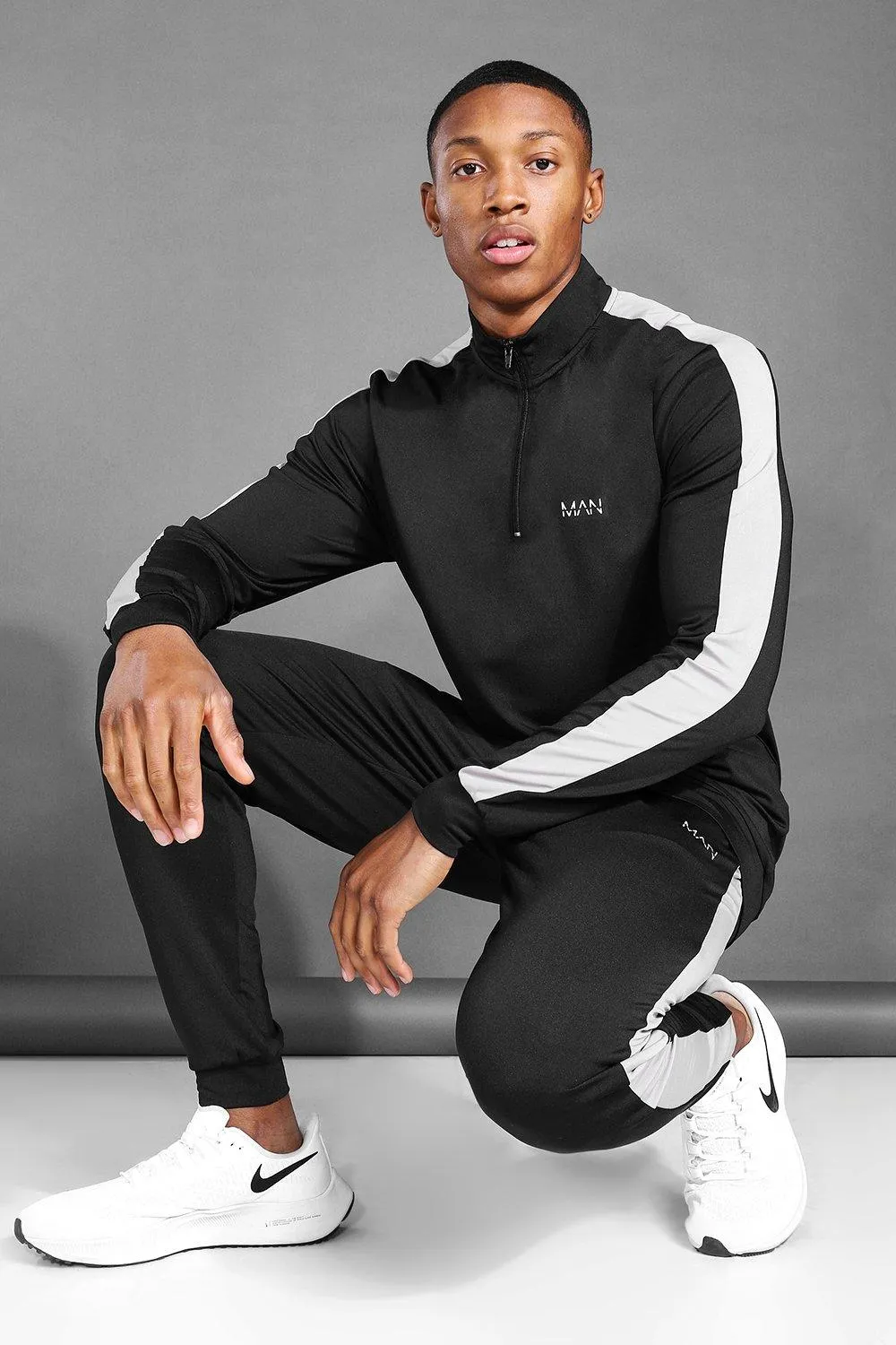 MAN Active Zip Funnel Neck Side Stripe Tracksuit | boohooMAN UK