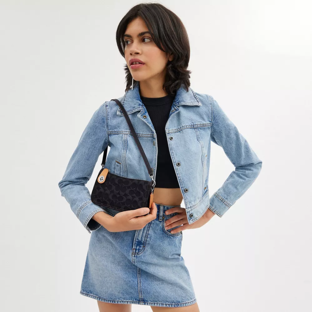 PENN SHOULDER BAG IN SIGNATURE DENIM